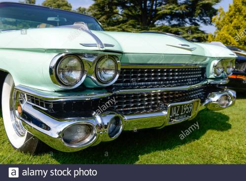 close-up-of-the-front-of-a-classic-1959-cadillac-coupe-de-ville-with-its-highly-decorated-radiator-grille-2B93K15