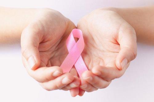 Hands_Holding_Pink_Ribbon
