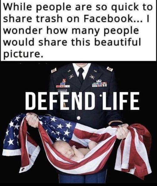 defend babies solider holding baby in American flag
