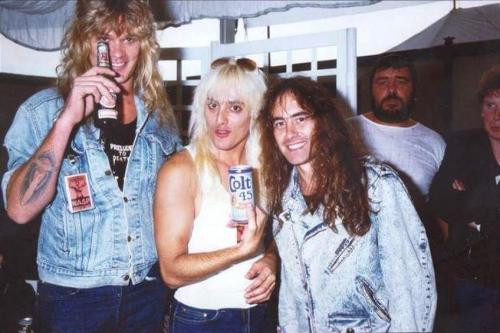 W.A.S.P. & Iron Maiden (Chris Holmes and Johnny Rod of W.A.S.P. with Steve Harris of Iron Maiden. Donington, 1987.)