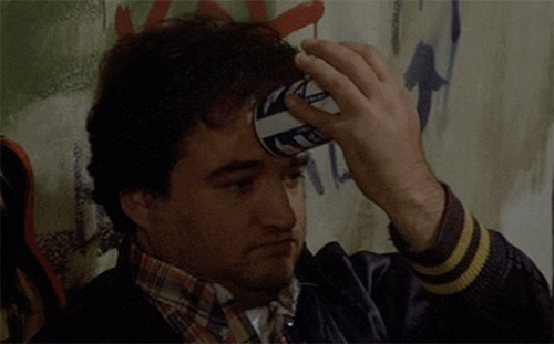 Animal House beer can crush to forehead