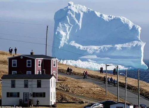 150 foot iceberg passes through Iceberg Alley near Ferryland, Newfoundland, Canada