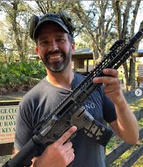 DONALD JR WITH AR15