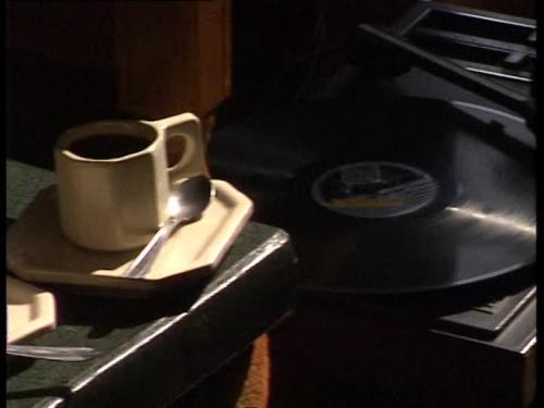 268776752-record-player-record-vinyl-coffee-cup-spoon