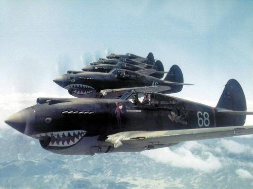 Kittyhawk fighters of the American Volunteer Group flying near the Salween River Gorge on the Chinese-Burmese border, 28 May 1942.