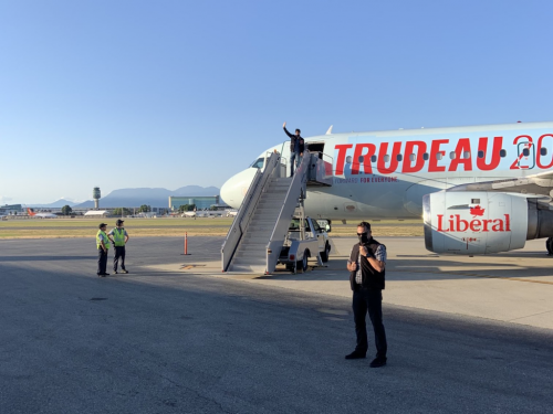 trudea on a stair