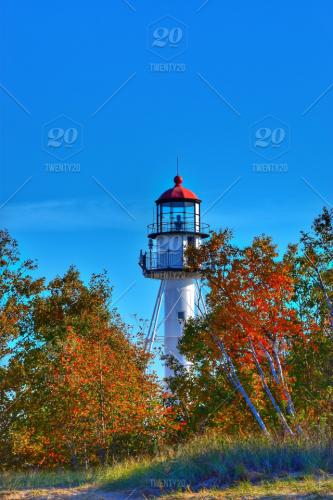 stock-photo-nature-autumn-colorful-lighthouse-michigan-vacation-fall-view-beautiful-9e82900b-d4f3-46e2-b66c-22421ad7ea61