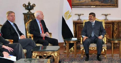 morsi-mccain-afp-670