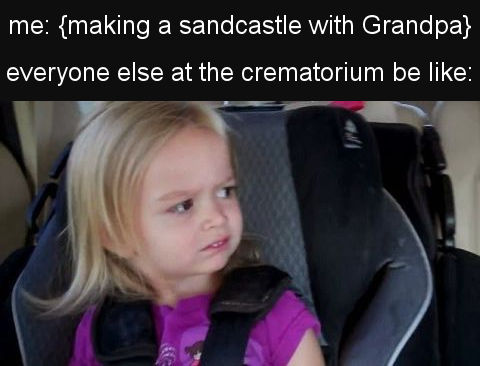 making a sandcastle with grandpa