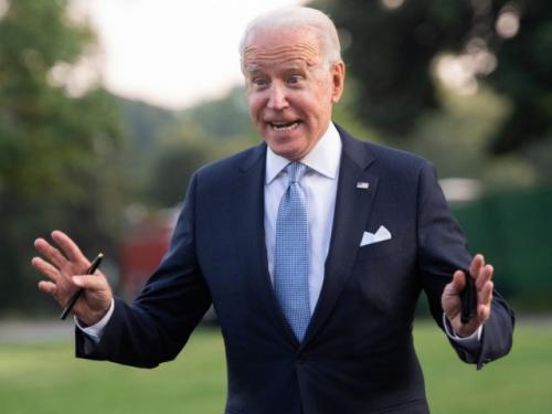 Joe-Biden-speaks-to-reporters-gestures-wide-arms-getty-640x480