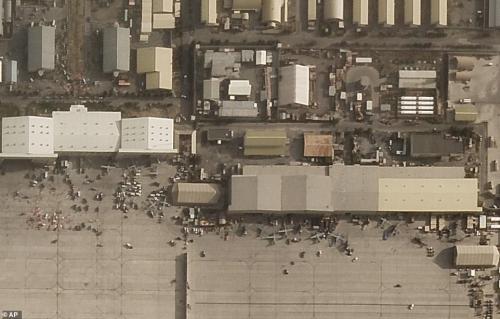 47328659-9942593-Satellite_images_of_Kabul_airport_show_the_mostly_disabled_aircr-a-81_1630436646414