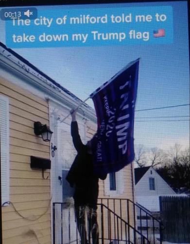 CITY SAID TAKE VDOWN TRUMP FLAG