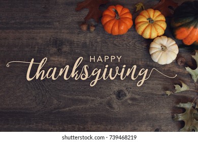 happy-thanksgiving-text-pumpkins-leaves-260nw-739468219