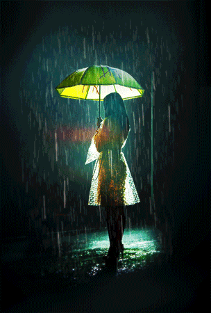 Woman in the dark rain with umbrella