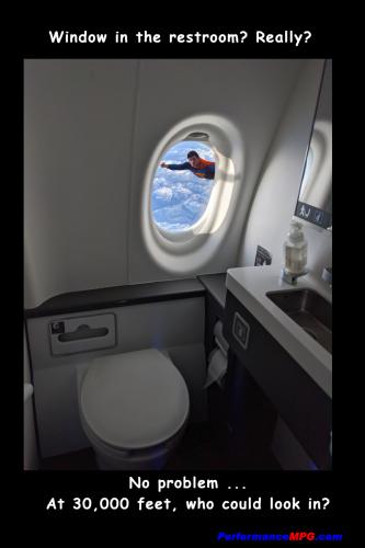 window_in_airplane_bathroom_superman_peeking_in