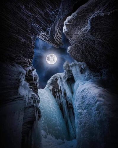 Full Moon view through cave opening