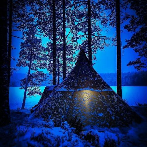 Light through snowy tent