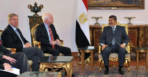 morsi-mccain-afp-670