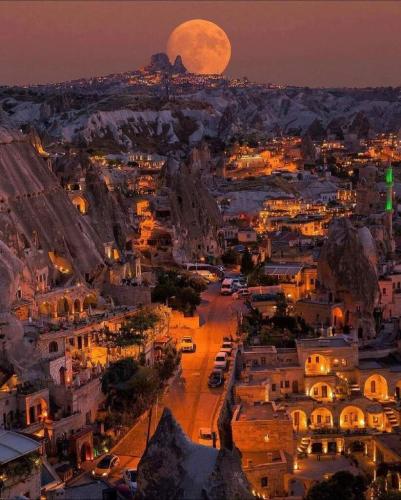 Desert city full moonrise