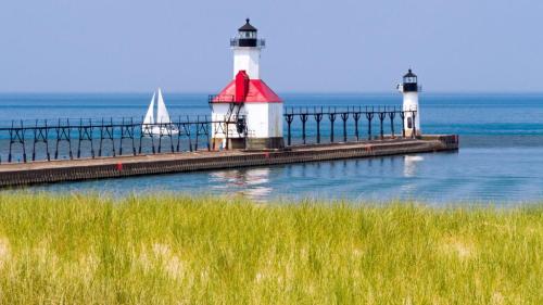 2 Lighthouses by green grass