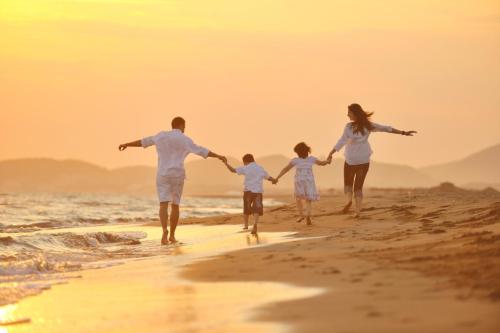 healthy family on beach vacation