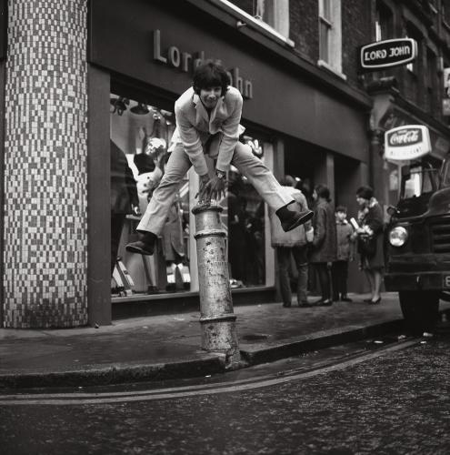Marvellous Photos of Carnaby Street 24th January 1967 Cat Stevens leaps a bollard.