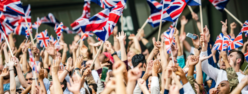 crowd-waving-union-jack-flags