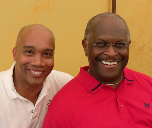 Kevin with Herman Cain at Fair Tax Rally
