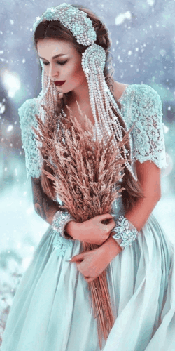 Woman with wheat and snow falling