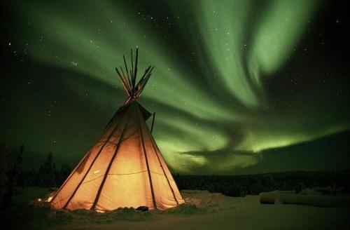 Native American TeePee under Aurora Borealis Northern Lights