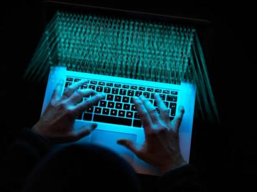 cyber-crime-a-hacker-using-a-virus-to-attack-software