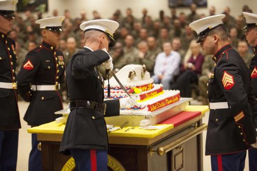 U.S._Marine_Corps_Col._Jeffrey_T._Conner,_commanding_officer,_School_of_Infantry-East,_cuts_a_piece_of_cake_at_the_command_cake_cutting_ceremony_aboard_Camp_Geiger,_N.C.,_November_7,_2013_131107-M