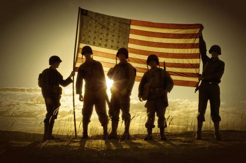 silhouette-of-soldiers-with-american-flag-186546665-5c7ac4ff46e0fb0001edc832