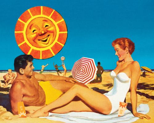 50s fit couple on beach