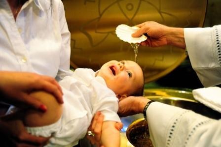 Baby being baptized