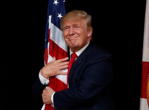 Trump_hugs_American_flag