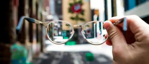 How to improve eyesight - clear glasses blurry  background