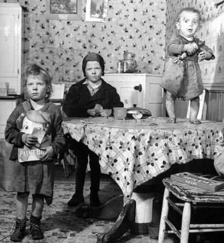 A steel worker's family in their kitchen in Pittsburgh. (1940s)