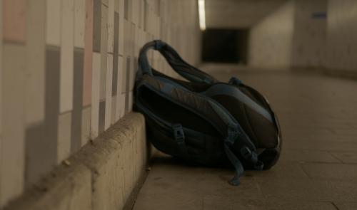 closeup-shot-of-a-black-rucksack-in-a-railway-stat-2025-02-02-20-29-37-utc (1)