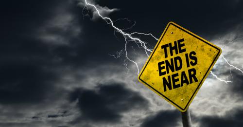 9912-stormy-sky-sign-saying-the-end-is-near-end-ti-928703879