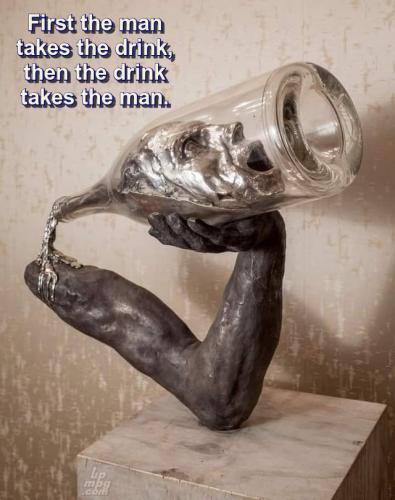 First the man takes the drink, then the drink takes the man