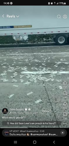 Armor Truck dropped wad of cash on freeway
