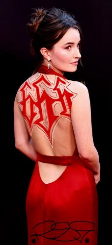 kaitlyn-dever-red-dress-back-1647442983~13