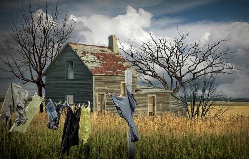 old-house-with-laundry-in-the-field-randall-nyhof