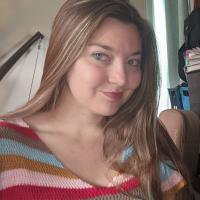 Angela L Schuster