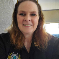 Roxann E Nelson